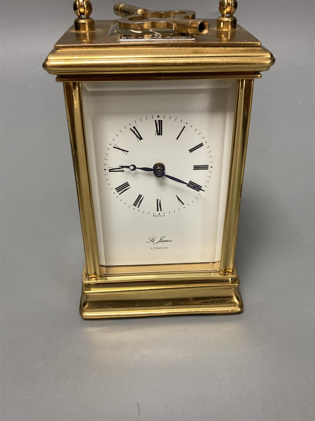 A modern French brass cased eight day presentation carriage timepiece